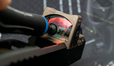 how to clean the lenses on a red dot sight