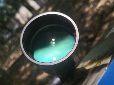 Rifle scope lens